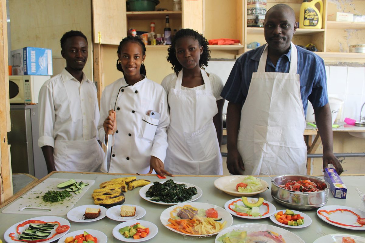 Hospitality trainees at a practical service setup
