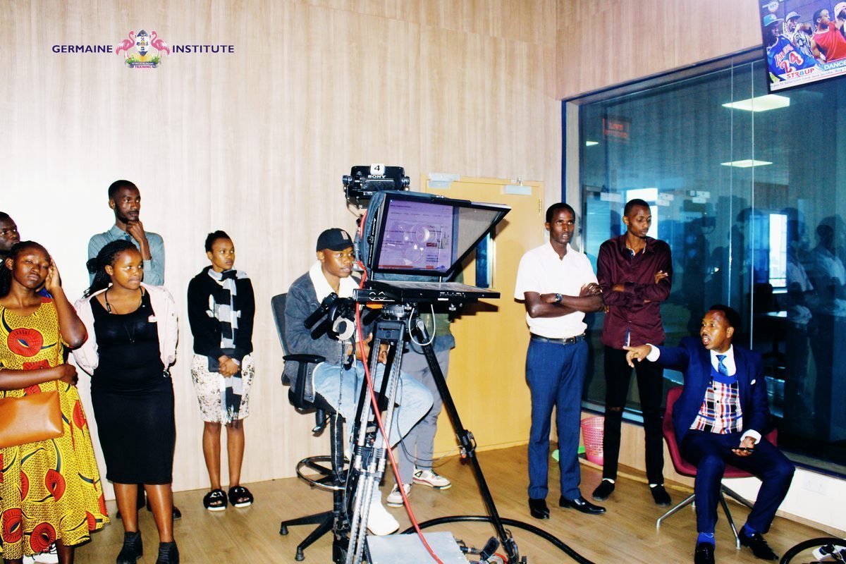Journalism trainees in the Germaine media studio