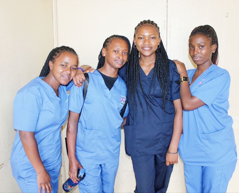 A group of Germaine Training Institute students together on campus