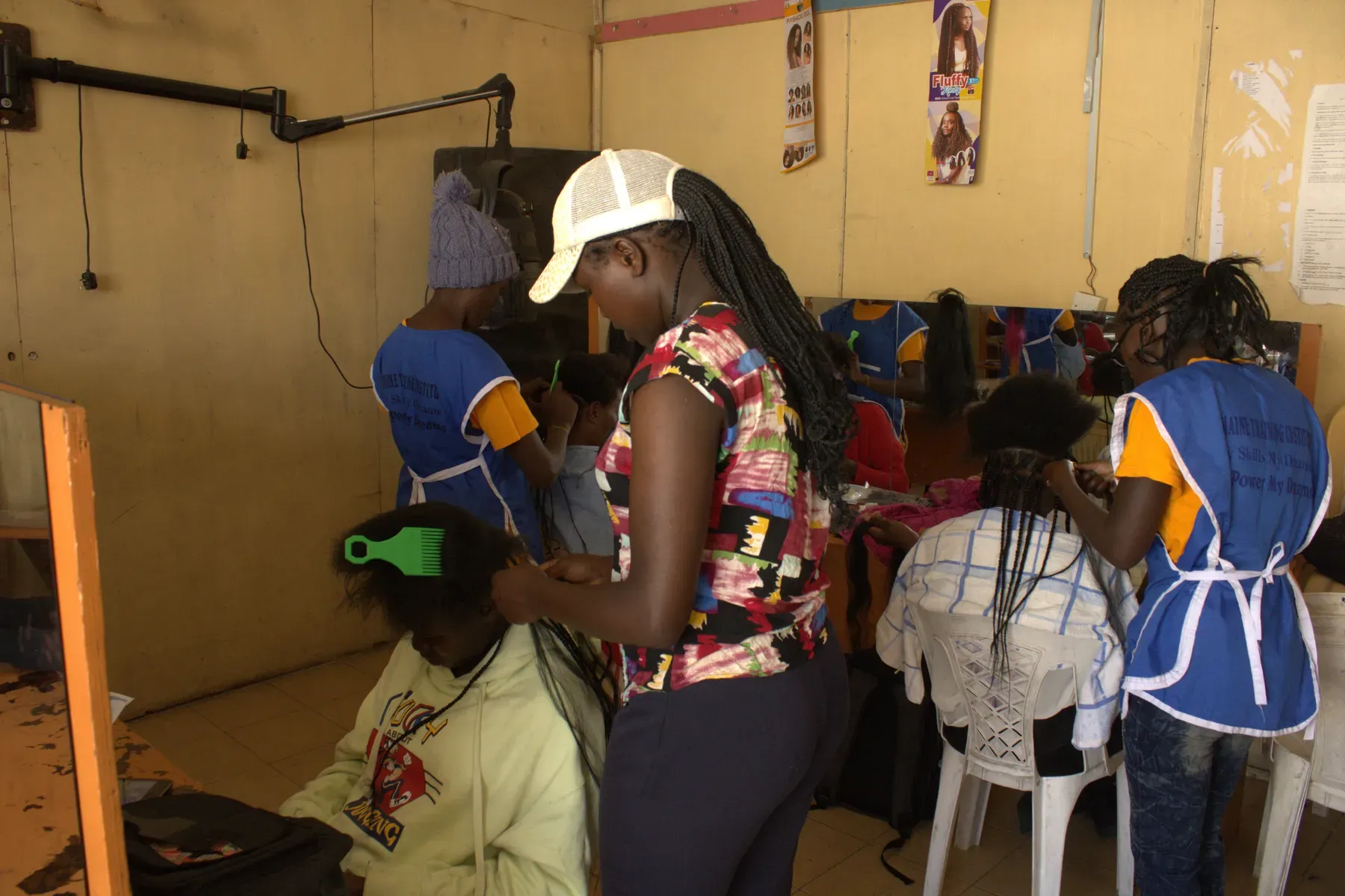 School of Cosmetology & Fashion Design students in practical training at Germaine Institute