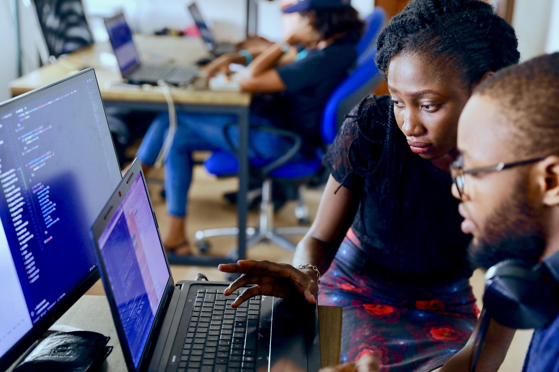 Students working hands-on with AI tools in a Germaine computer lab