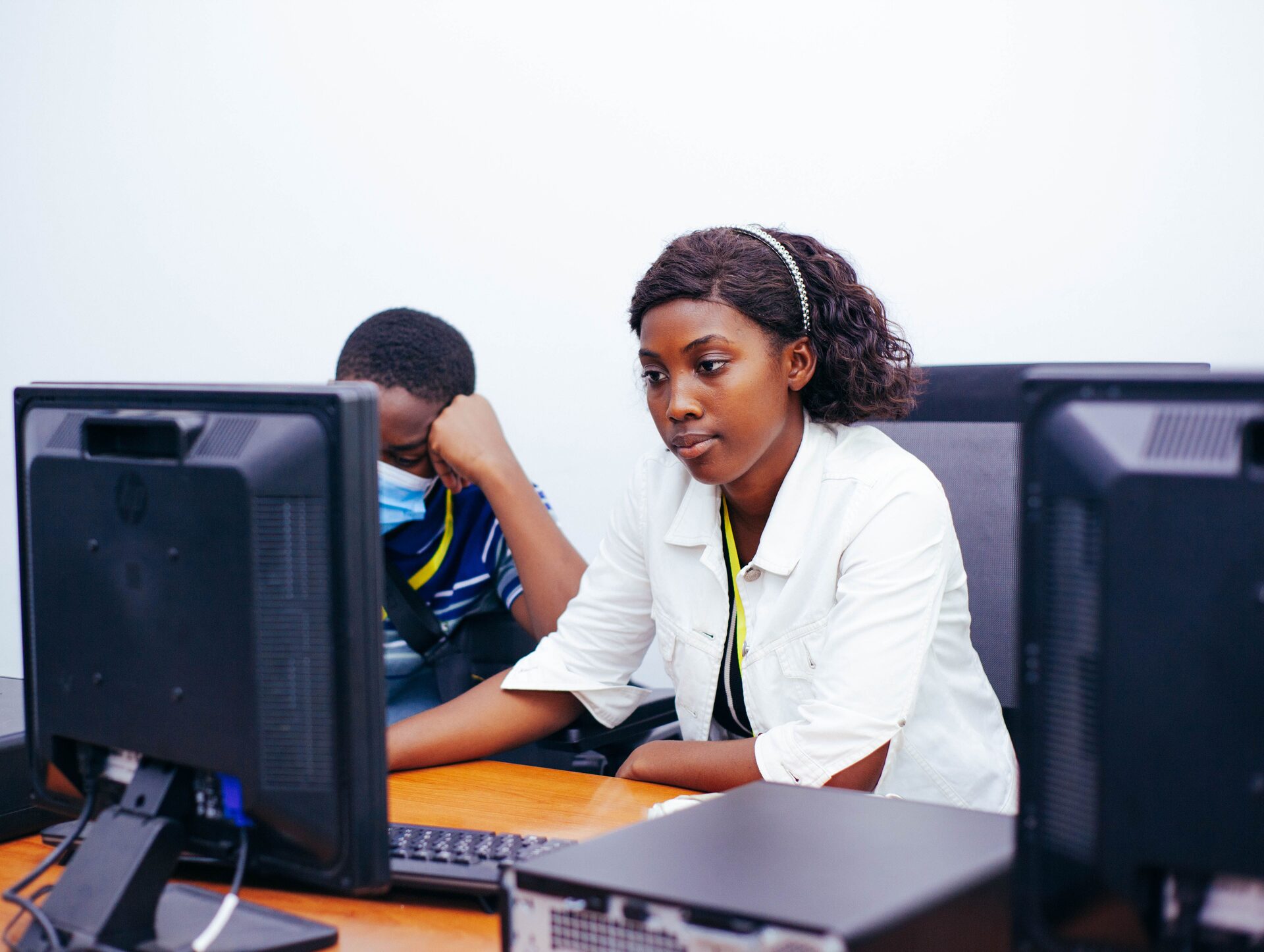 Students working together at computers in a Germaine lab